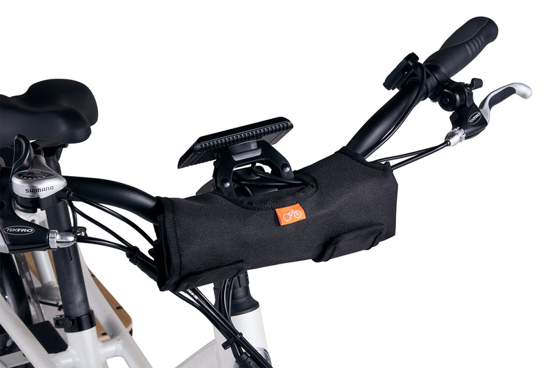 black tool bag strapped onto bike handlebar