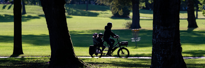 Man with children on RadWagon Electric Cargo Bike